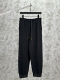 Louis Vuitton pants in dark color with drawstring waist and cuffed hem