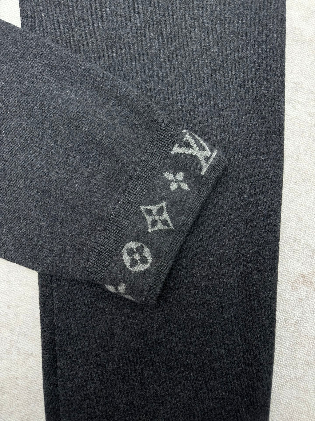 Louis Vuitton pants leg cuff with small embroidered logo pattern in light gray