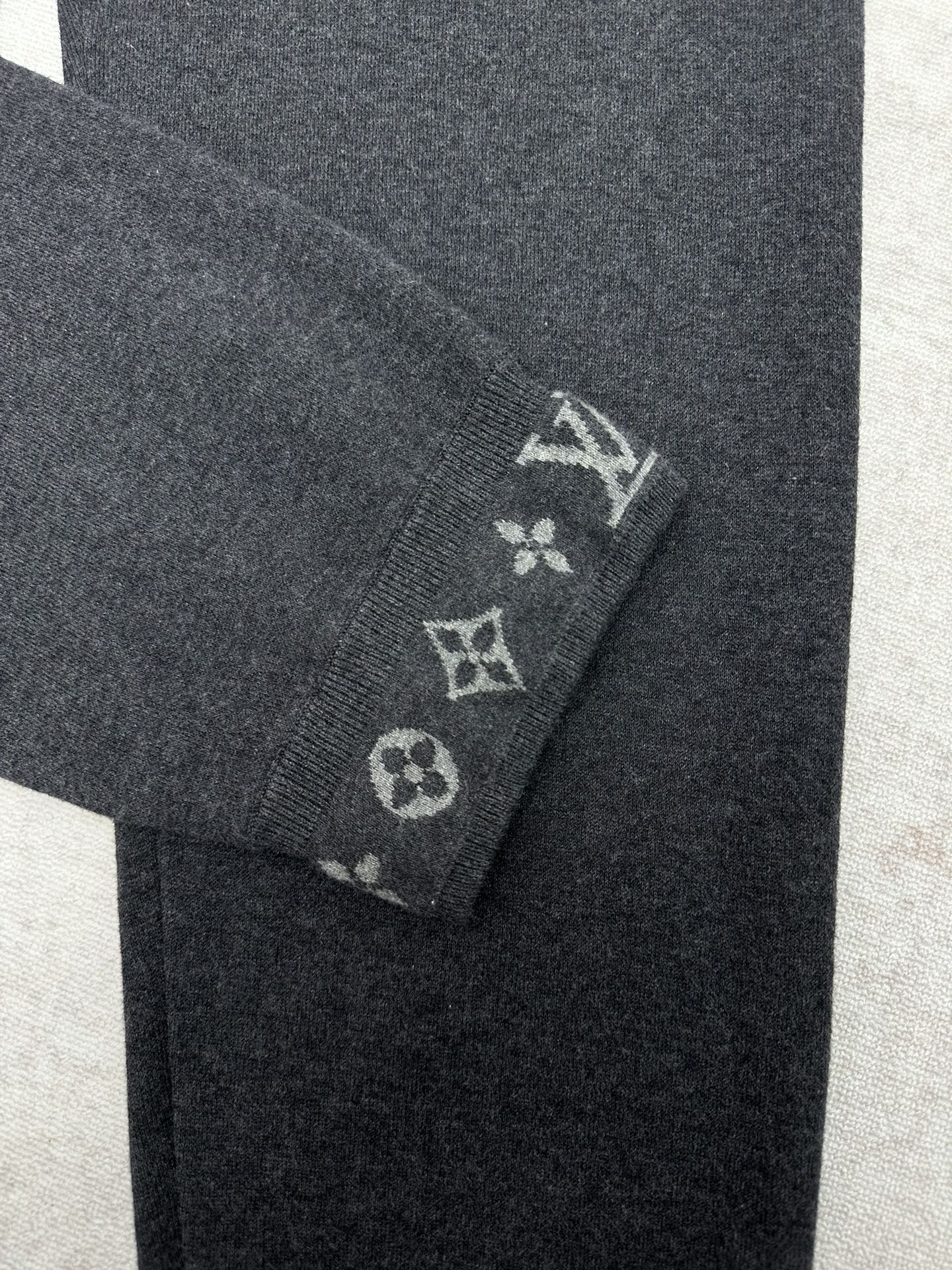 Louis Vuitton pants leg cuff with small embroidered logo pattern in light gray
