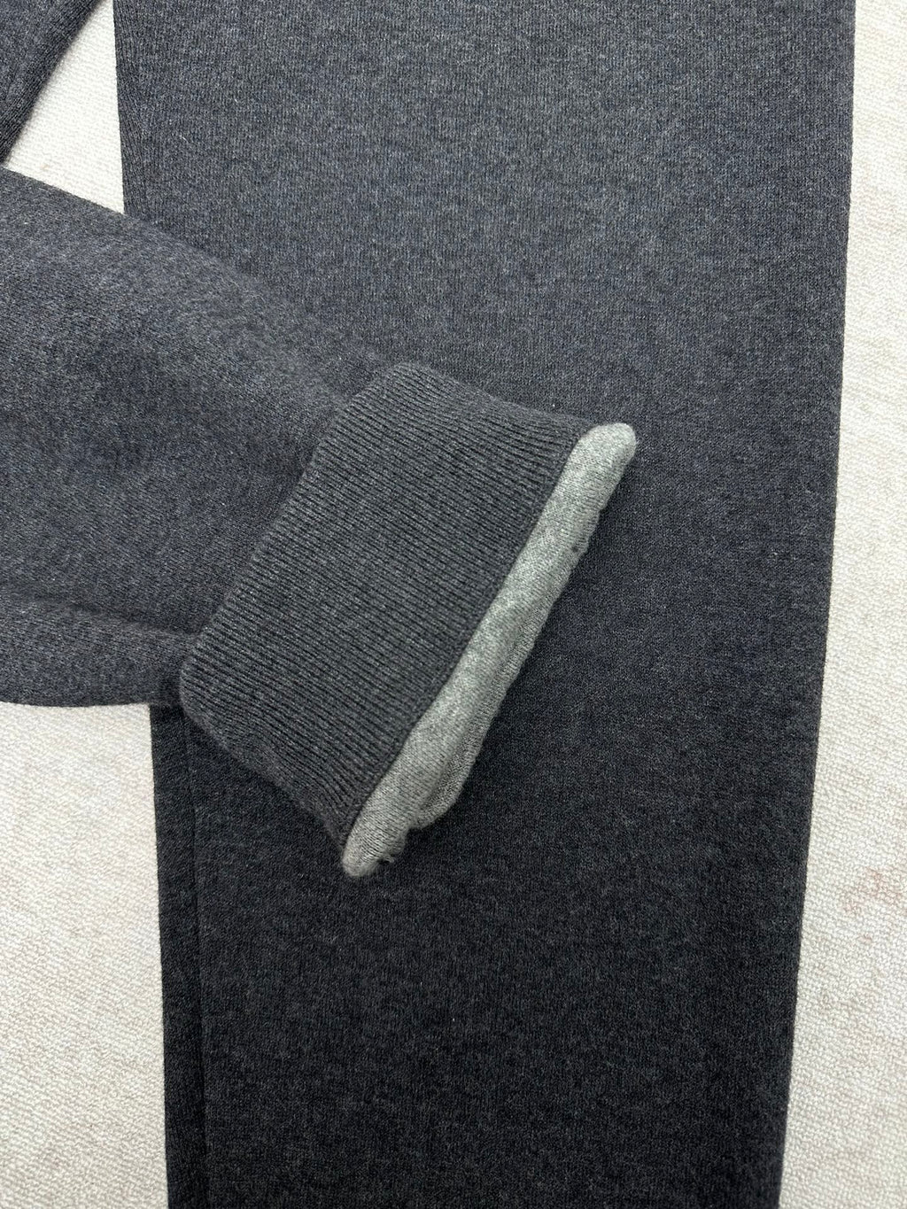 Louis Vuitton pants fabric detail at cuff with textured knit and dark color