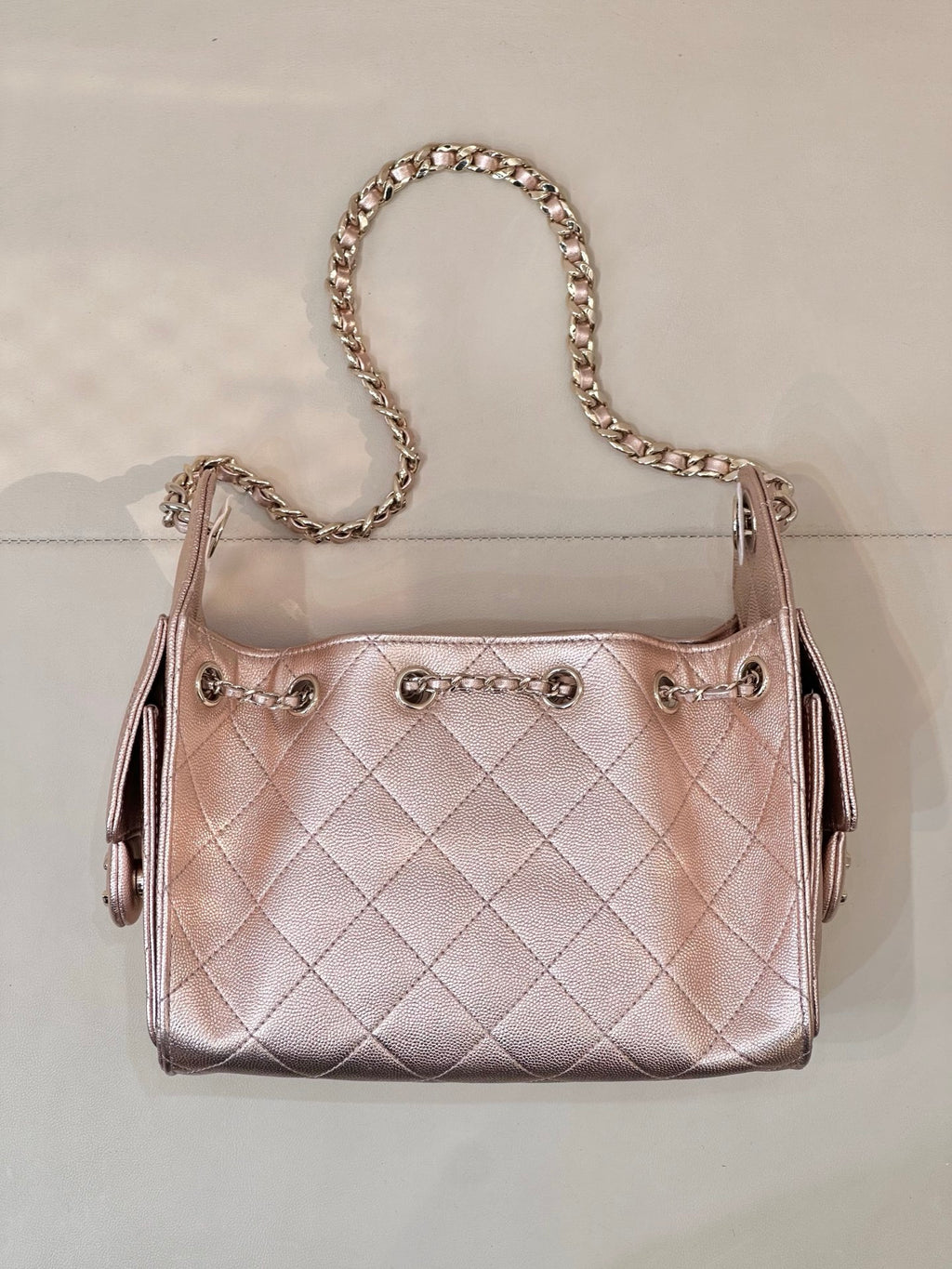 Chanel quilted handbag with chain strap, rose-pink leather, top handle and front hardware