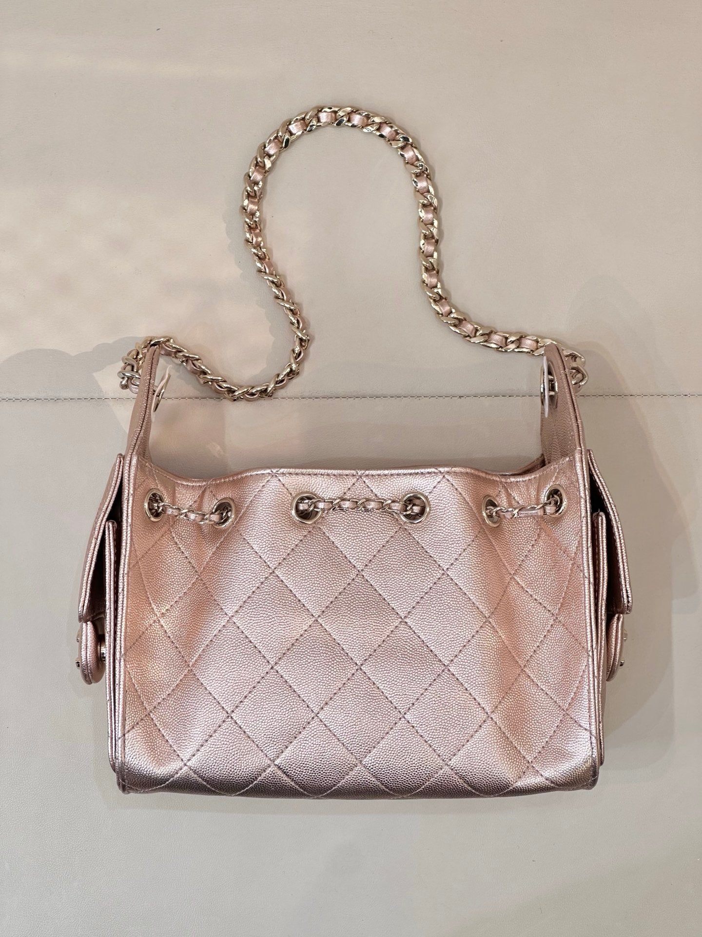 Chanel quilted handbag with chain strap, rose-pink leather, top handle and front hardware