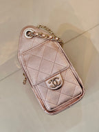 Chanel quilted mini bag with chain strap, rose-pink leather, quilted flap and CC emblem