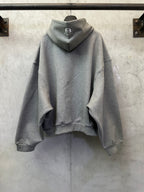 Balenciaga gray pullover hoodie with hood, relaxed sleeves, and kangaroo pocket.