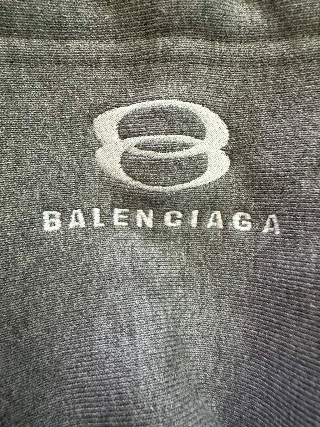 Balenciaga logo graphic on grey knit hoodie fabric