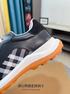 Burberry sneaker side with check panel stripe and white laces, orange outsole