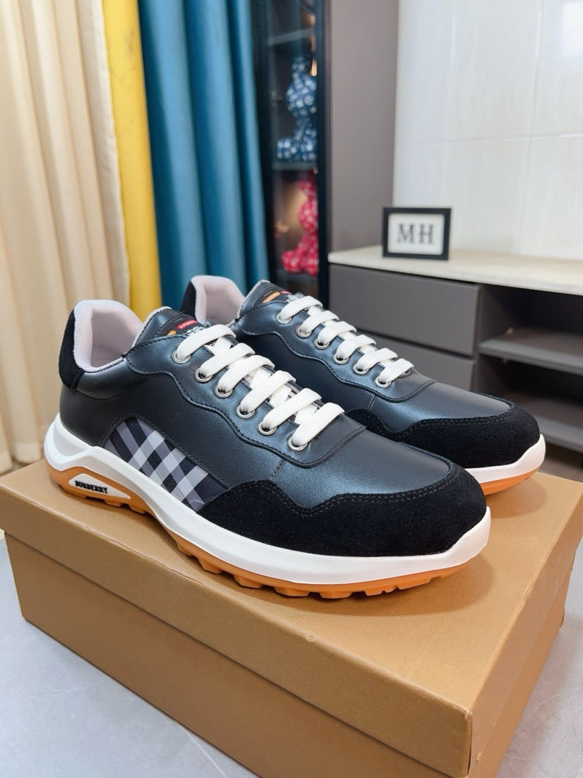 Burberry sneakers in dark navy with check panel detail and orange rubber outsole