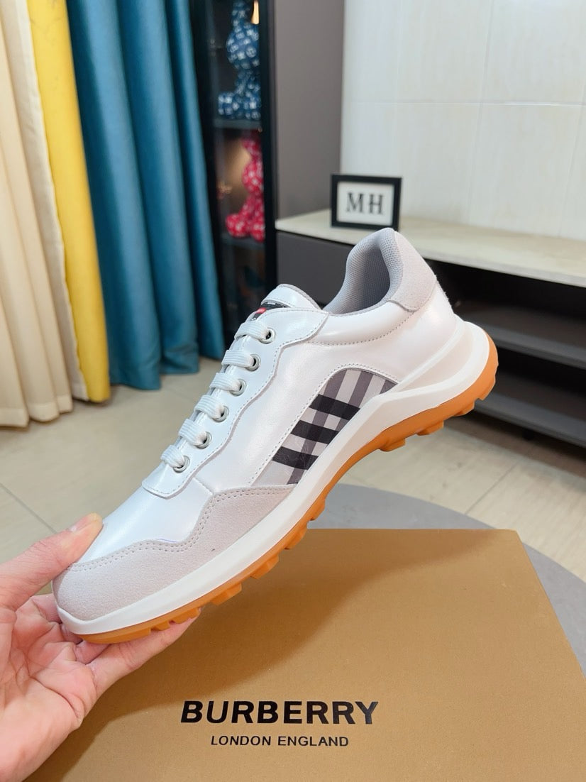 Burberry white leather low-top sneakers with check panel and orange-trim outsole