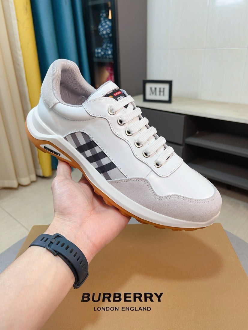 Burberry white leather running sneakers with check side panel and orange sole
