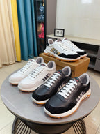 Burberry sneakers pair in white and black, check panel detail, gum rubber sole