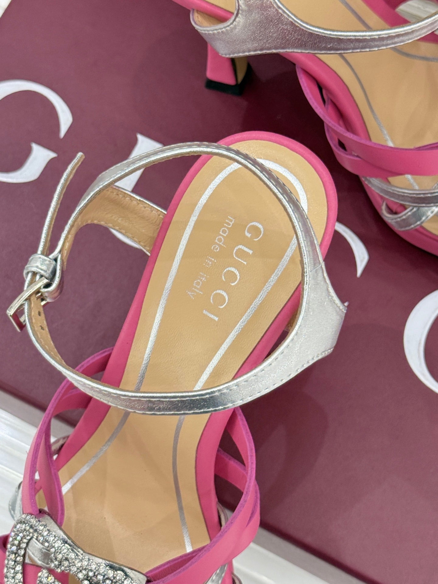 Gucci ladies heeled sandal close-up, silver straps and pink toe with ankle strap