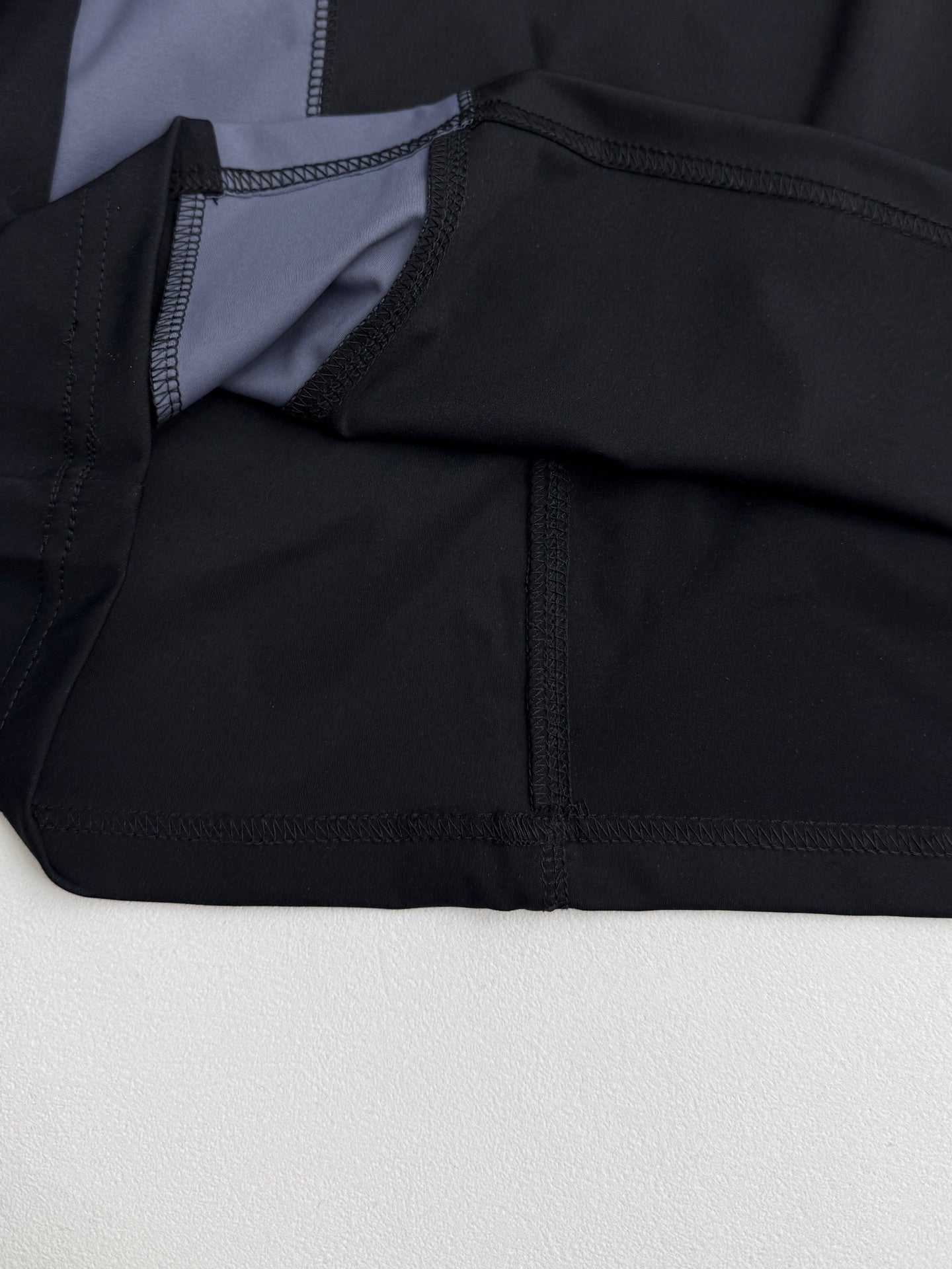 Louis Vuitton short-sleeve T-shirt interior seam and opening detail with black lining