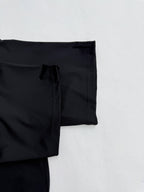 Louis Vuitton short-sleeve T-shirt sleeve and side seam detail on black fabric