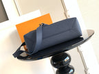 Blue Louis Vuitton shoulder bag with long strap and front flap