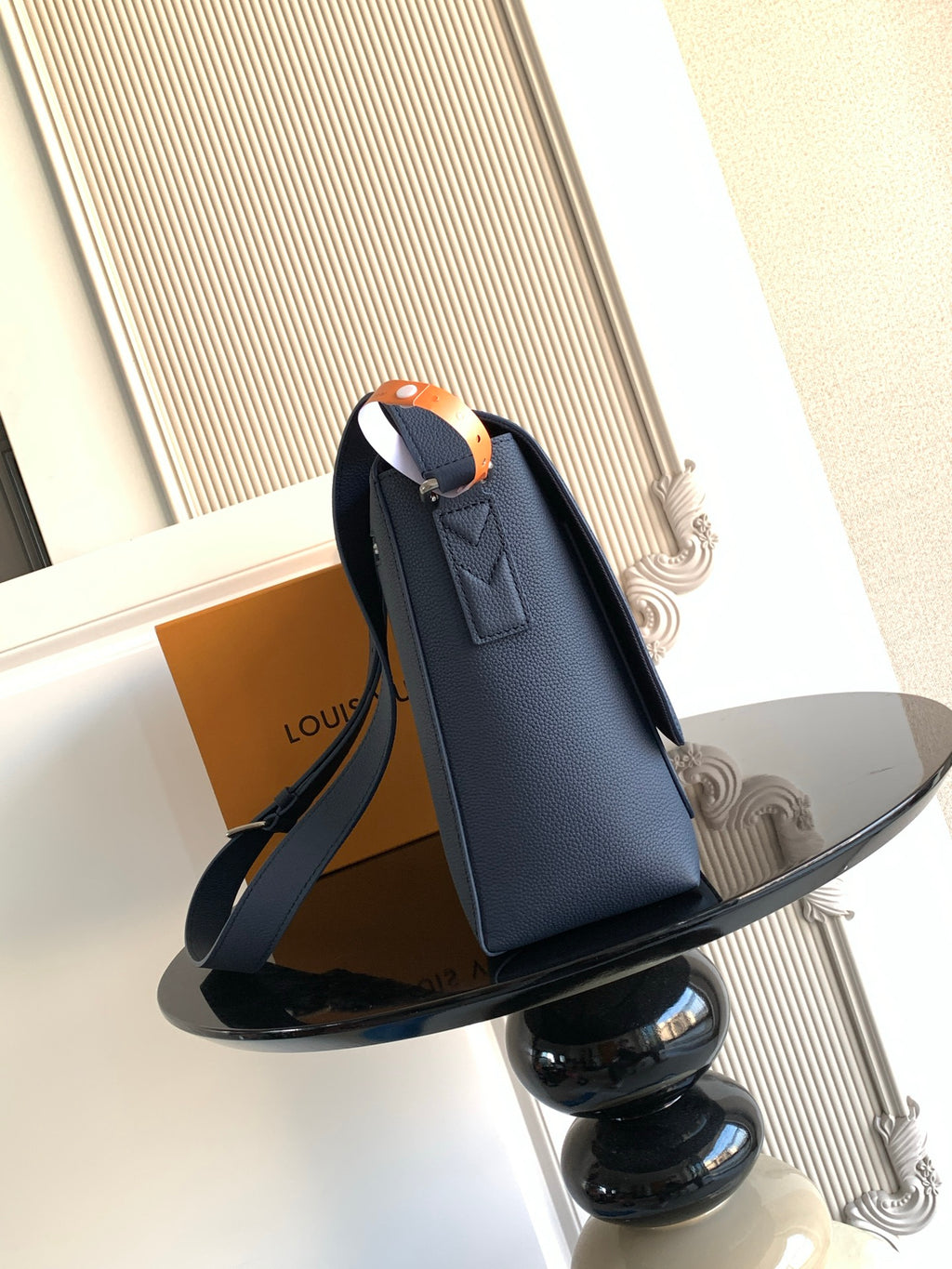 Louis Vuitton crossbody bag in navy leather, adjustable strap and flap front