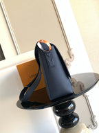 Louis Vuitton crossbody bag in navy leather, adjustable strap and flap front