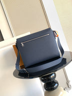 Blue Louis Vuitton crossbody bag with front flap and zipper