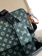 Louis Vuitton green monogram bag with textured leather strap and front buckle