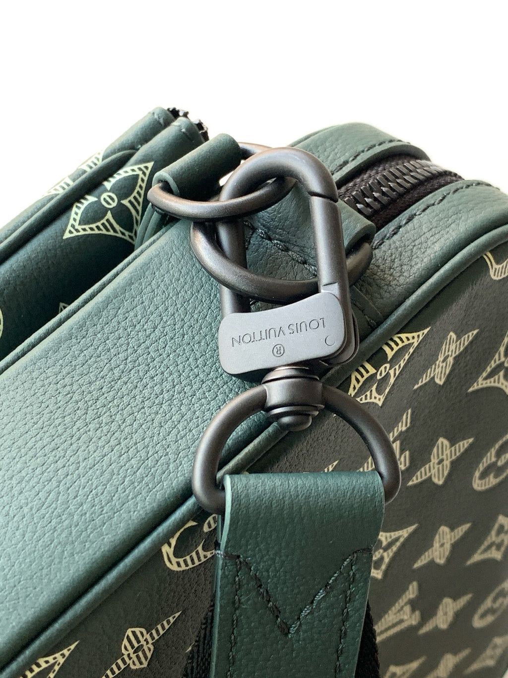 Louis Vuitton men's monogram bag in dark green, leather strap with metal D-ring and tag