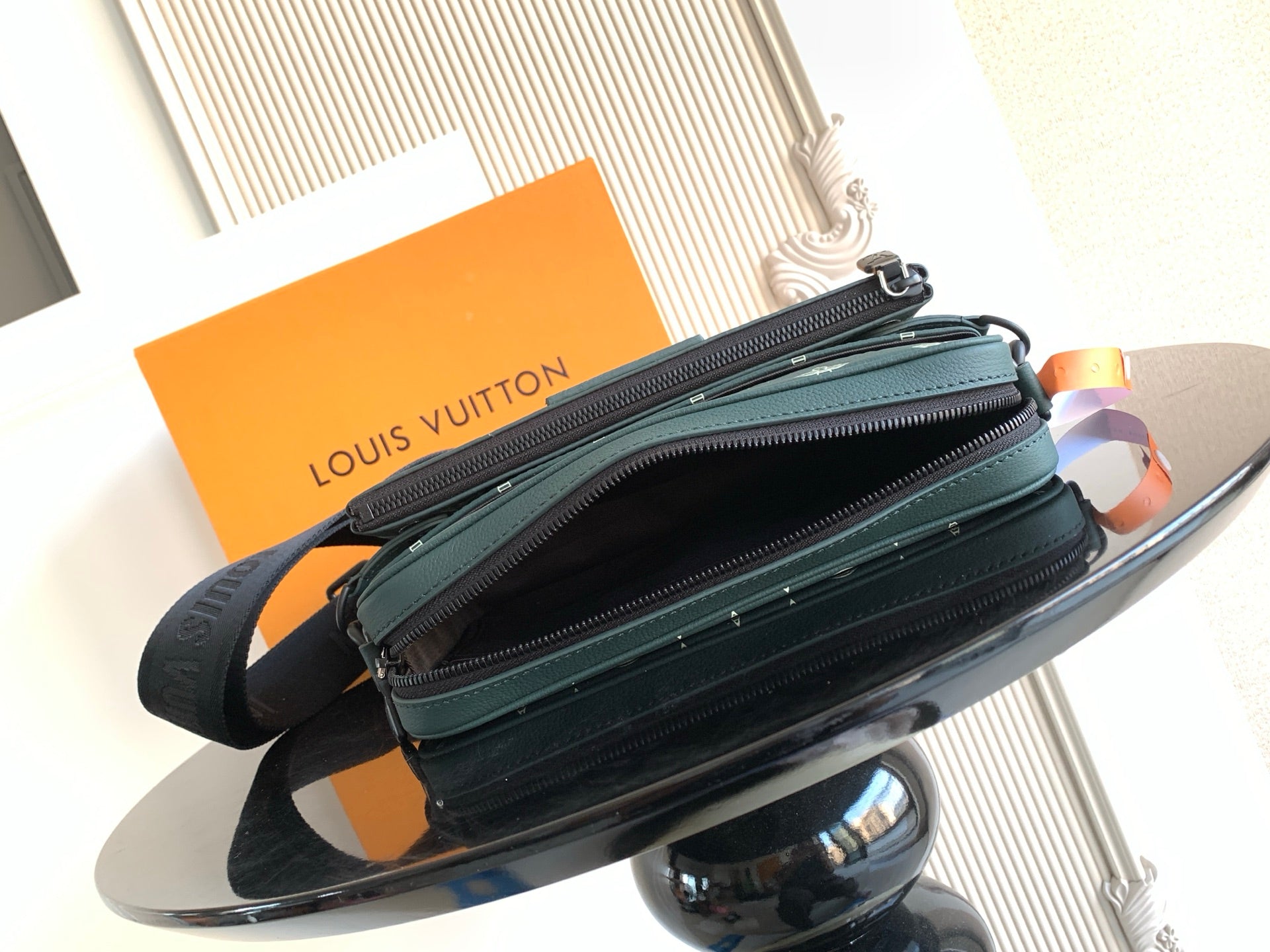 Louis Vuitton men's monogram bag in dark green, dual zip opening and strap
