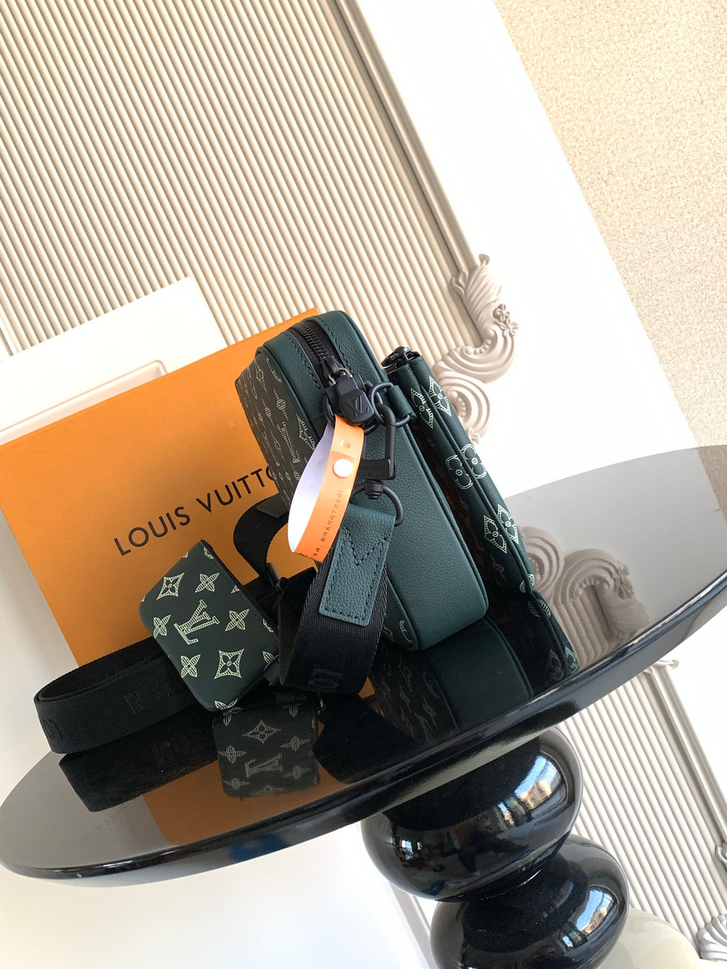 Louis Vuitton green monogram shoulder bag with front flap, strap, and gold hardware