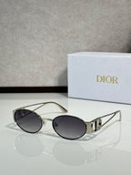 Gold-framed round sunglasses with dark tinted lenses