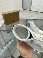 Burberry white high-top sneaker shown with open collar and lace-up front