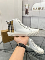 Burberry white high-top sneakers with plaid side stripe and lace-up design