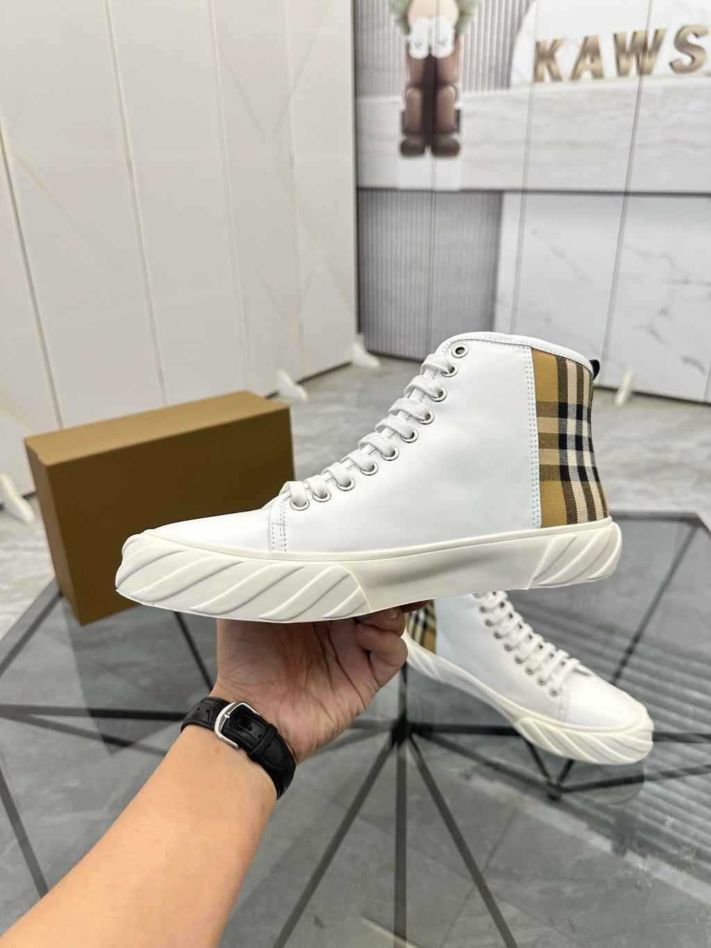 Burberry white high-top sneaker with plaid heel panel and thick ridged sole