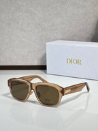 Dior sunglasses with tortoise-brown frames and dark lenses, gold Dior logo