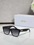 Dior sunglasses with black square frames and dark lenses, metal logo detail on temples