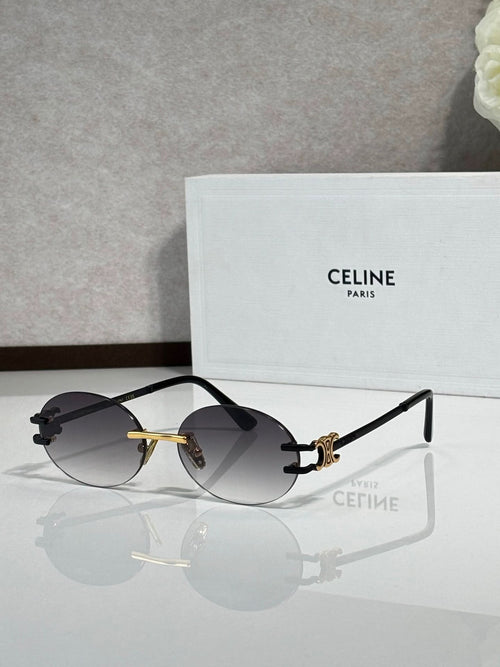 Celine sunglasses with black round lenses and thin metal frames, gold-tone accents