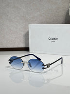 Celine sunglasses with blue round lenses and metal frames, gold-tone details
