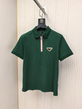 Green short-sleeve polo shirt with half-zip and logo patch