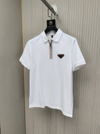 White polo shirt with stand collar, zip placket, and small triangular chest logo