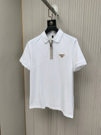 White Prada short-sleeve polo shirt with half-zip placket and gold logo badge