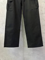 Black cargo pants with straight wide legs and stitched hem