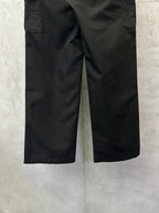 Black cargo pants showing leg shape and side cargo pocket