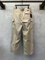 Beige cargo pants with back flap pockets and belt loop