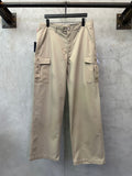 Beige cargo pants with front button and flap cargo pockets