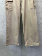 Beige cargo pants with straight legs and side pocket openings