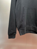 Moncler dark gray hoodie side view with kangaroo pocket opening