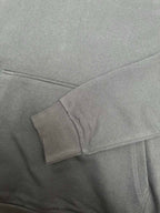 Moncler dark gray hoodie cuff and drawcord near neckline