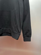 Moncler dark gray hoodie showing kangaroo pocket and ribbed cuffs