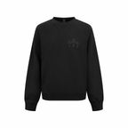 Black crewneck sweatshirt with long sleeves and small front logo graphic