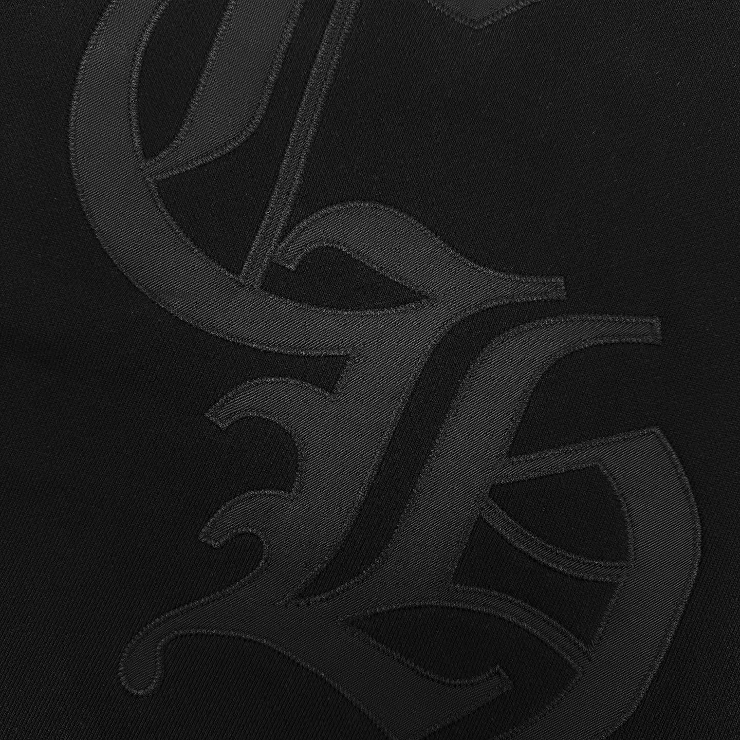 Large embroidered logo graphic on sweatshirt back