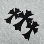 Black applique-style star graphic on heather gray sweatshirt