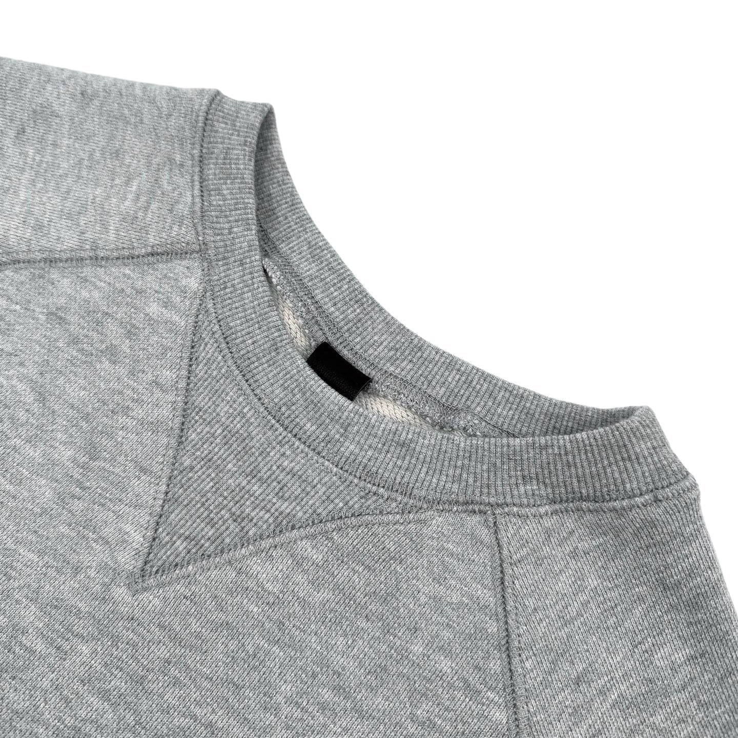 Heather gray crewneck sweatshirt with ribbed collar and raglan seam
