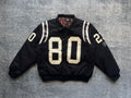 Black varsity jacket with white-striped sleeves and large “80” front patch