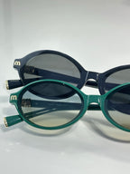 Miu Miu glasses set, teal and navy round frames with dark lenses